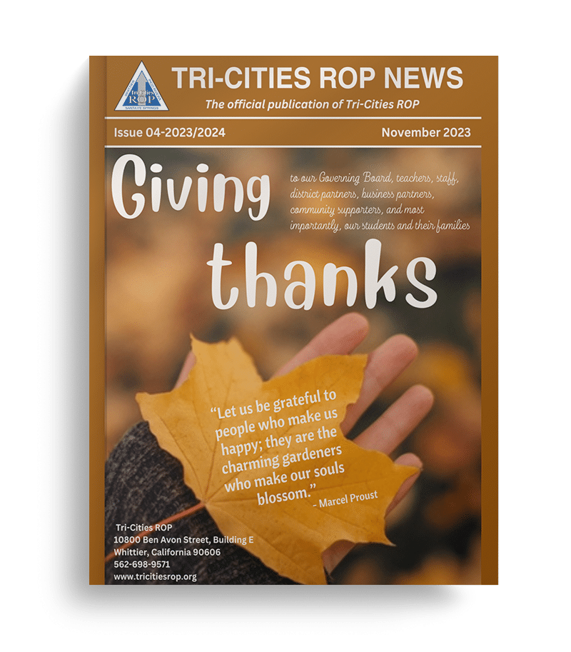 Cover of November Newsletter featuring a leaf in someone's hand and a title that says "Giving thanks"